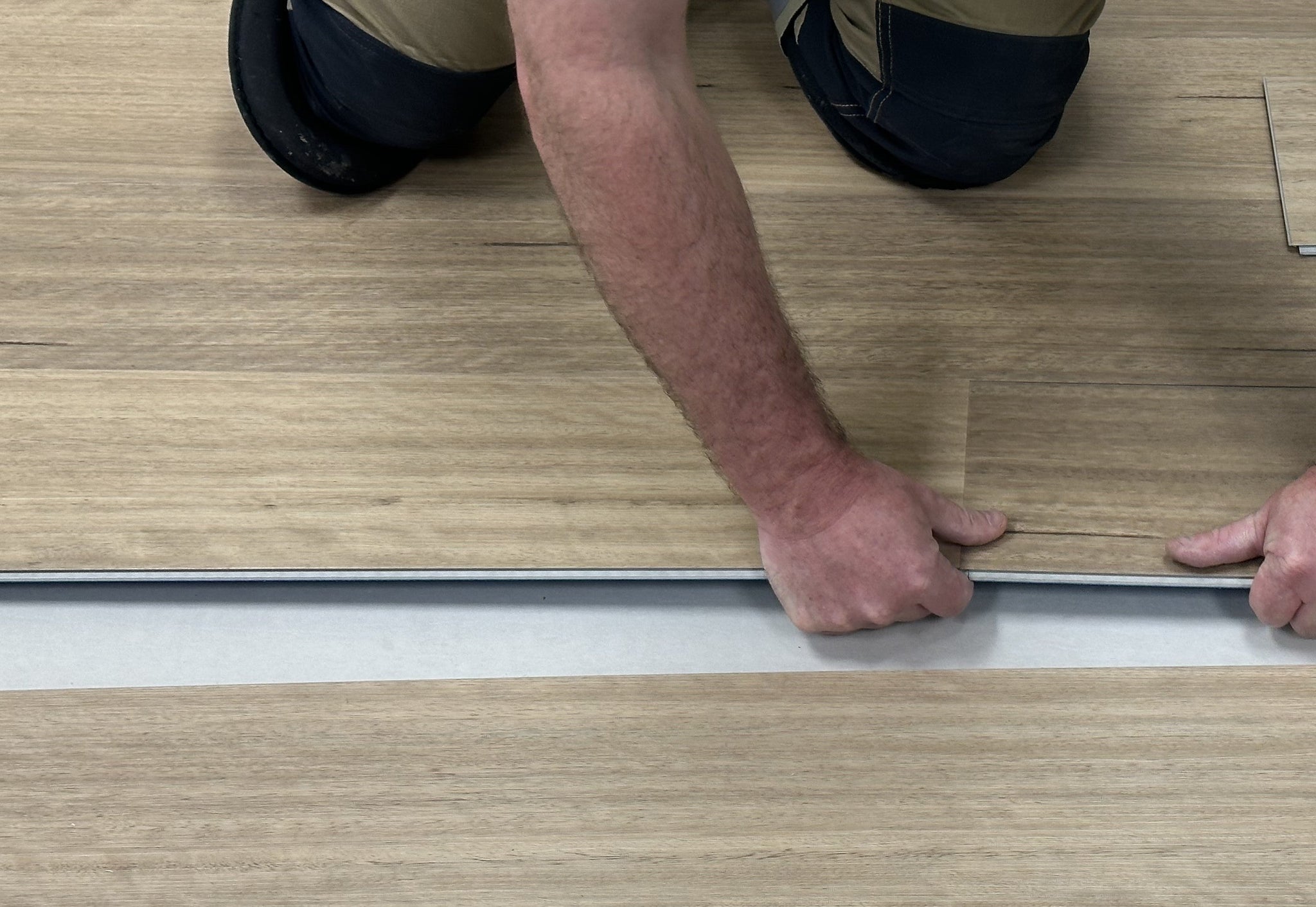 Hybrid Flooring Installation Made Easy with the Angle/Angle - Sidetap System